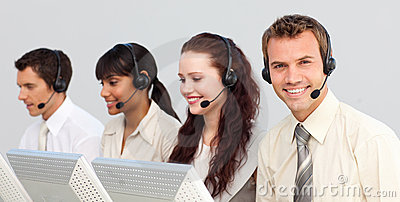 smiling-businessteam-working-call-center-11853327